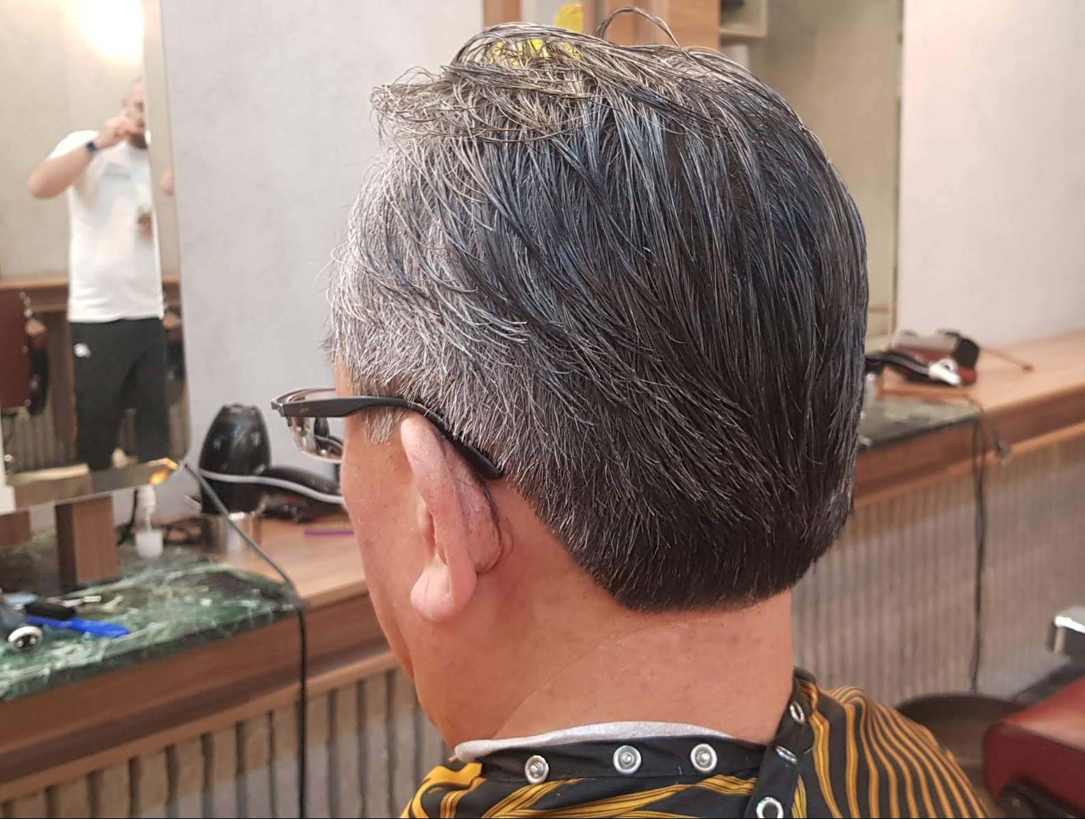 Classic taper haircut finished at Al Barber Shop
