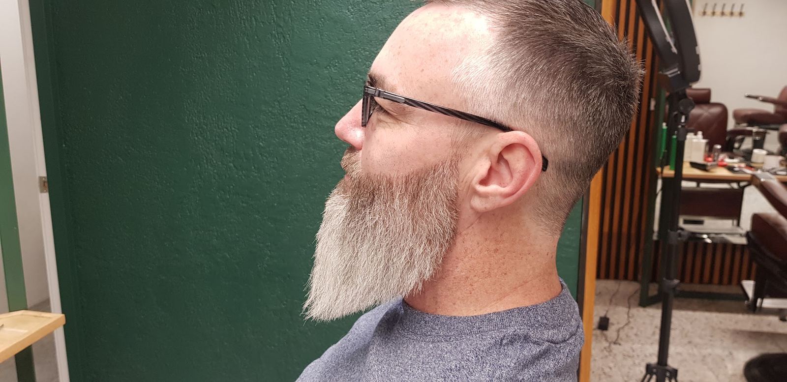 Clean skin fade and beard finish at Al Barber Shop